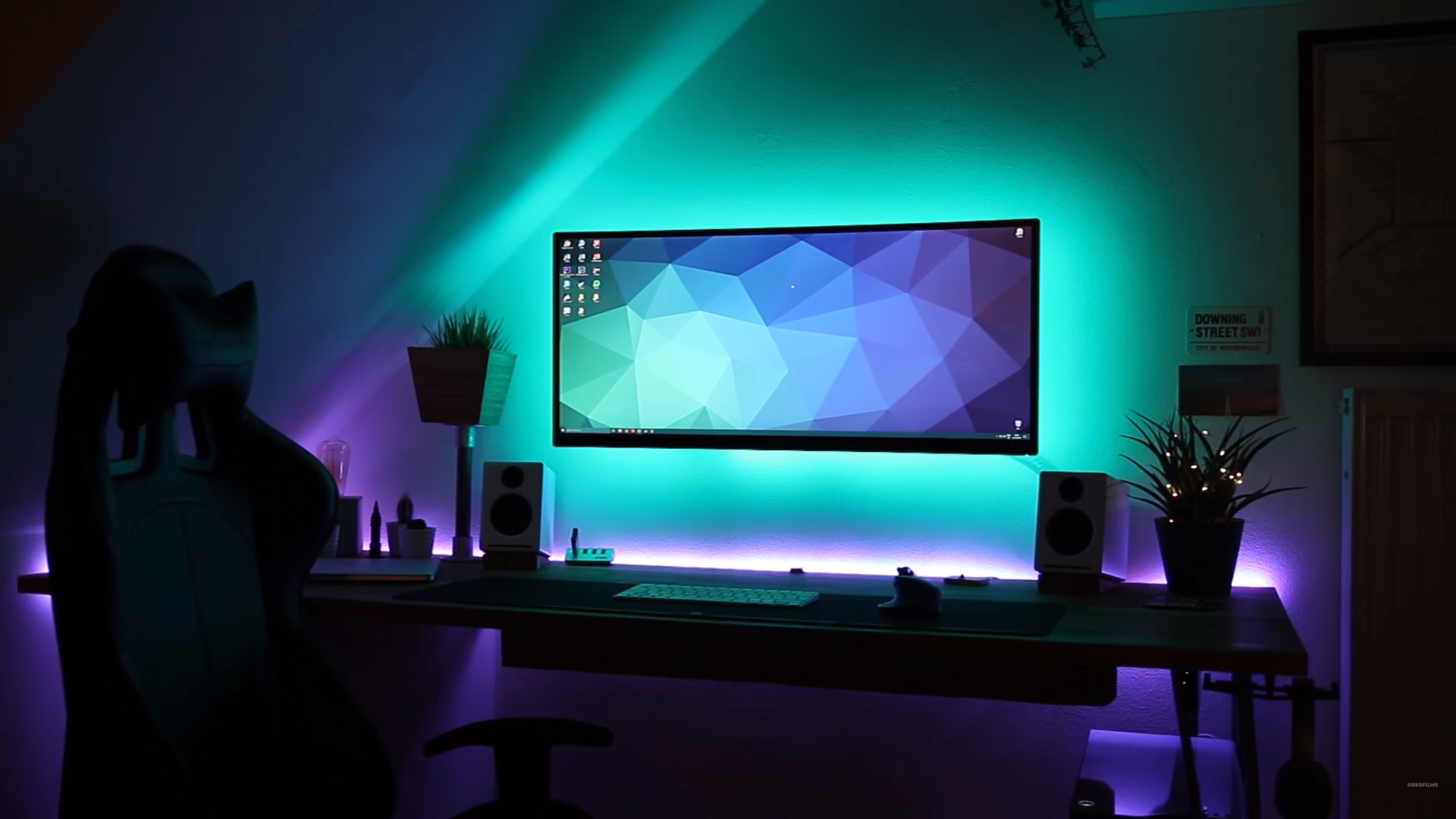 A sophisticated clean dark background layout showing faint neon lights that capture a gaming aesthetic